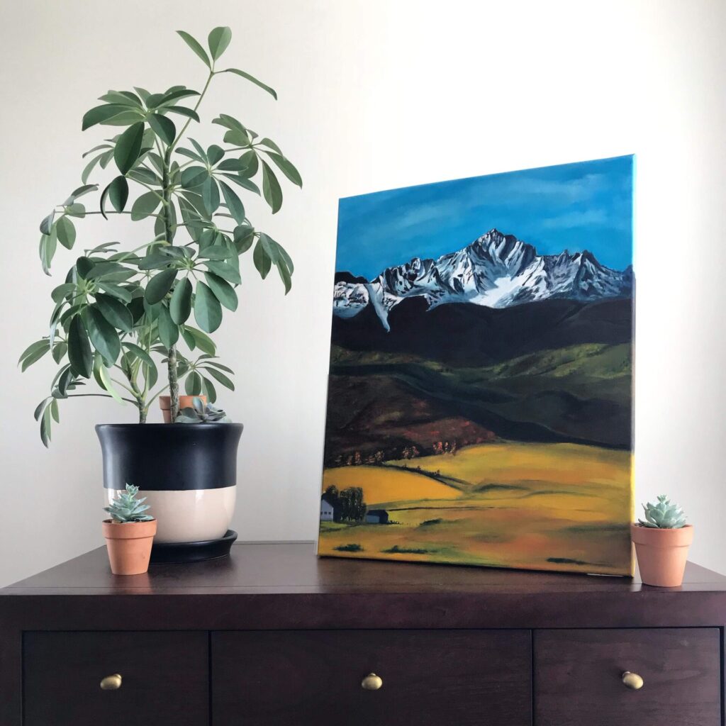 Painting of Mt. Elbert sitting on a dresser